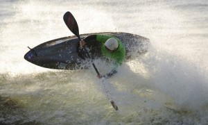 Surf Kayak Launching off the lip in Steamer Lane, Santa Cruz California