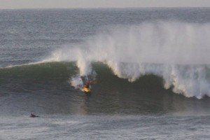 Caroline Janganant's photo of John Bonaventure surfing the first day of 2011 santa cruz surf kayak festival